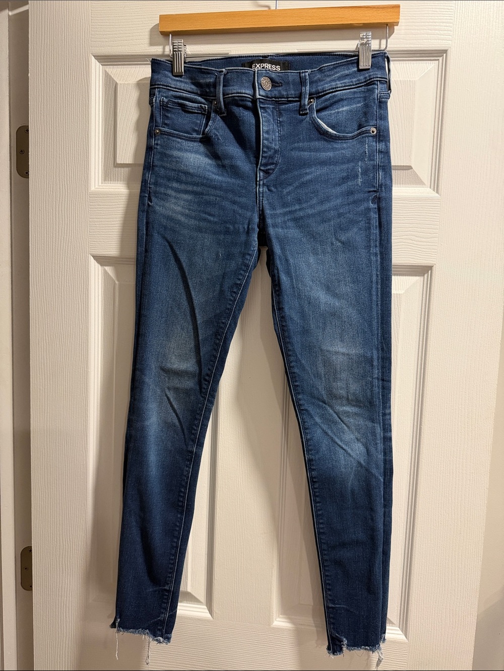 Express Women's Dark Blue Skinny Jeans with Raw Hem